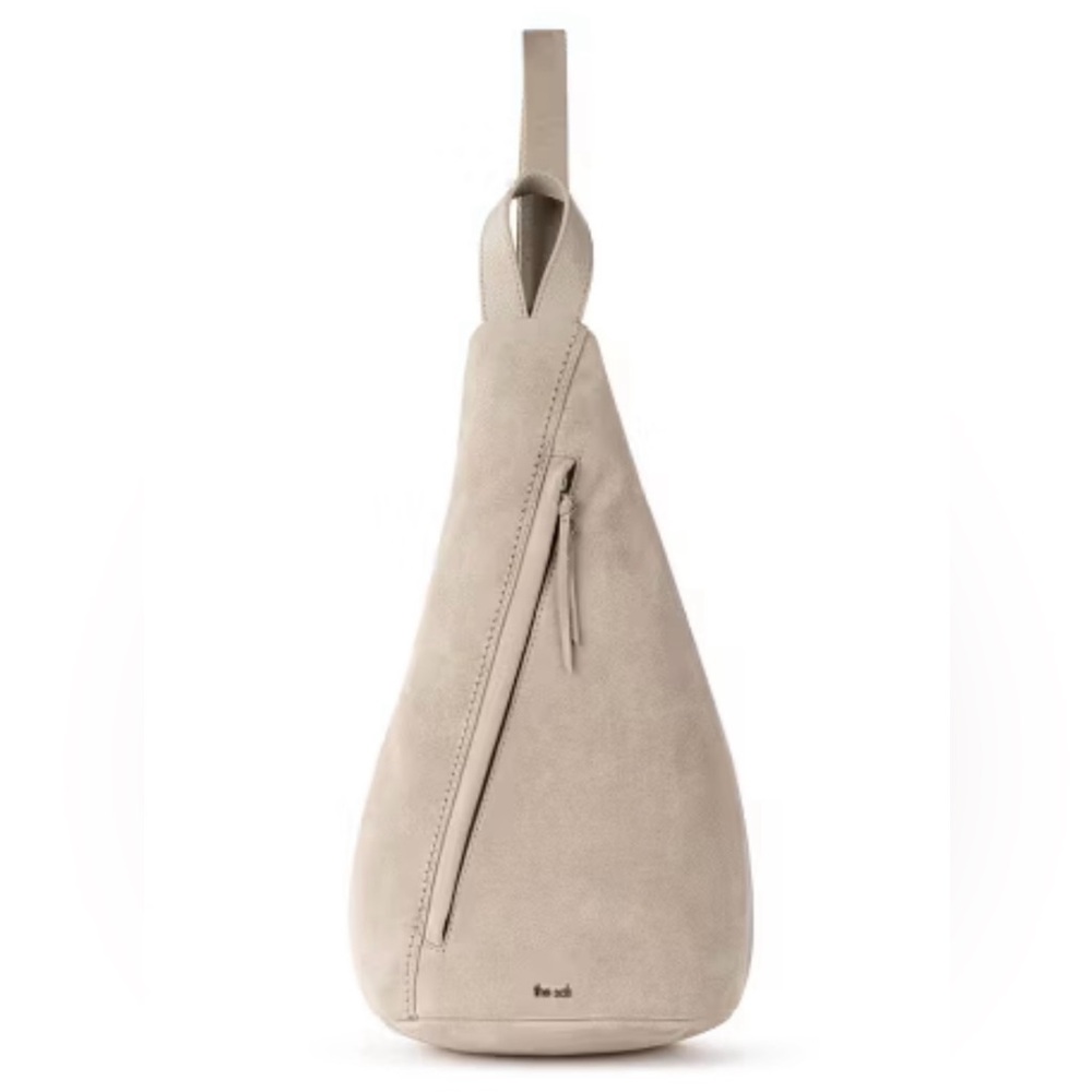 The Sak Geo Sling Backpack - Suede Leather in color Sand Minimalist